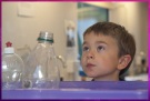 Jamie mesmerised by the Flashbang Science demonstration in the mobile lab
